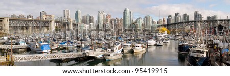 Vancouver BC Canada City Skyline with Burrard and Granville Bridges from Granville Island Panorama