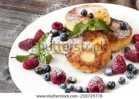 Cottage cheese pancakes  on a white plate