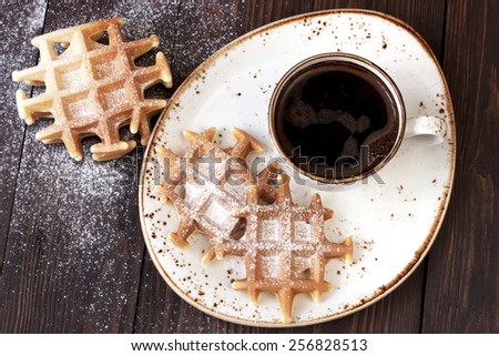Fresh home baked  waffles with fresh black coffee