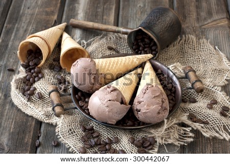 Chocolate ice cream cone  with coffee beans
