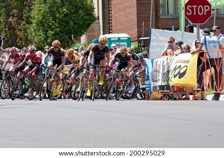 JUNE 15, 2014: Cyclists race for lead at final stage of 2014 North Star Grand Prix in Stillwater, Minnesota. About 300 top pro cyclists from around the world compete in the prestigious event.