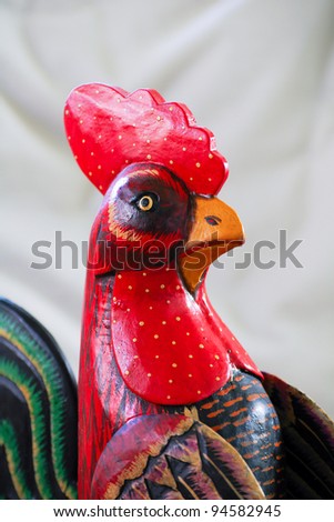 Hand painted red rooster wooden figurine profile of head and partial body