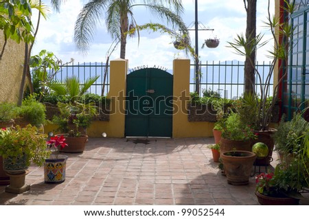 Patio of home in Lourdes neighborhood at Lake Chapala Mexico with mountains on horizon