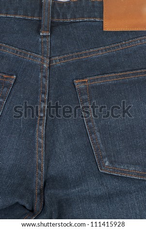 Close-up blue jean back showing pocket design