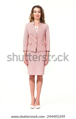 beautiful business woman fashion model in pink office suite