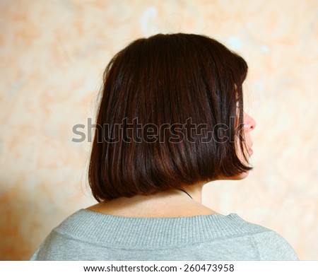 short caret woman hair cut from behind