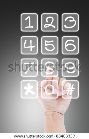 hand pushing transparent telephone buttons
