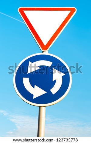 two road sign on blue sky background