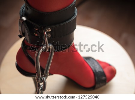 Chained Leg in Leather Cuff