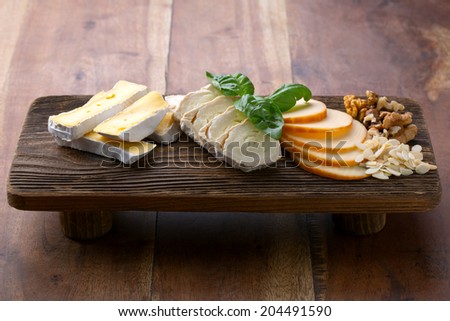 cheese on wooden platter