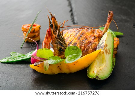 grilled guinea fowl with shrimp and tropical fruits