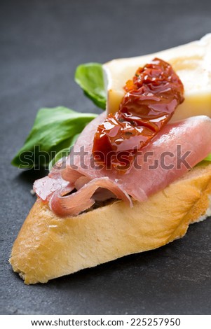 canapes with ham and yellow cheese
