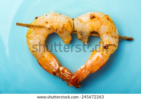 shrimps love on blue plate