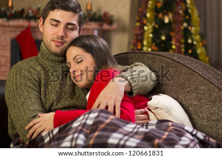 beautiful couple in love at christmas night