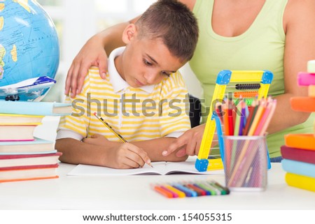 Boy asked his mother to help him to do homework
