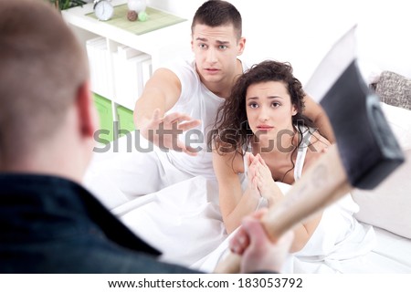 angry husband with hatchet caught cheating wife with lover