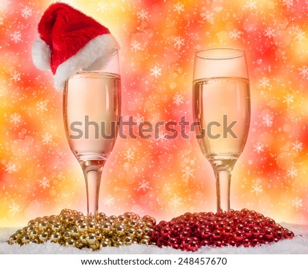 glasses of champagne gold and red pearls, Christmas concept
