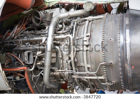 opened aircraft engine in the hangar