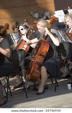 BUDAPEST - JULY 22: Members of Texas Youth Orchestra perform on stage at Millenaris July 22, 2009 in Budapest, Hungary.