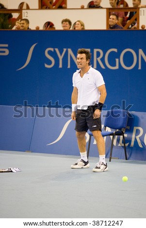 BUDAPEST-OCTOBER 10: Pat Cash gets angry because lost a shot of Tennis Classics 2009 on October 10, 2009 in Budapest, Hungary