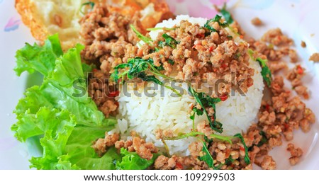 Thai food Thai spicy food, Fried pork with sweet basil.whit basi