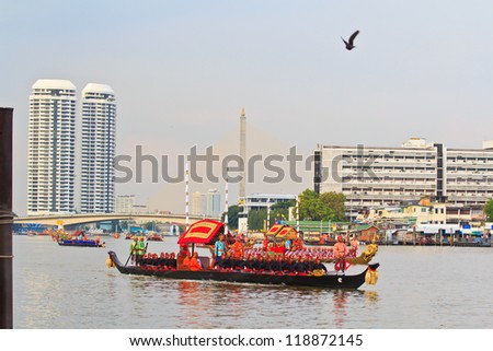 BANGKOK,THAILAND-NOVEMBER 9:Decorated barge parades past the Grand Palace at the Chao Phraya River during Fry the Kathina ceremony cloth of Royal Barge Procession on Nov. 9, 2012 in Bangkok,Thailand