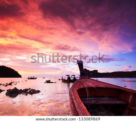 Ship Sea stones at sunset Phi Phi Island thailand