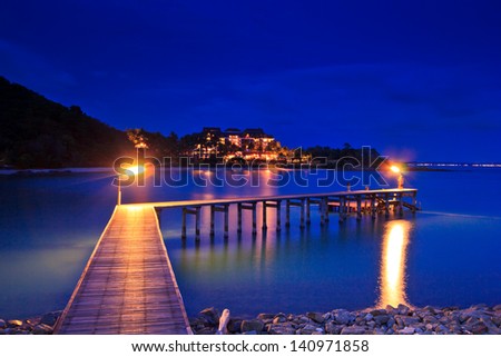 Wooded bridge in the port Twilight light