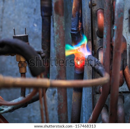 Welding copper pipes and Air conditioner repairman