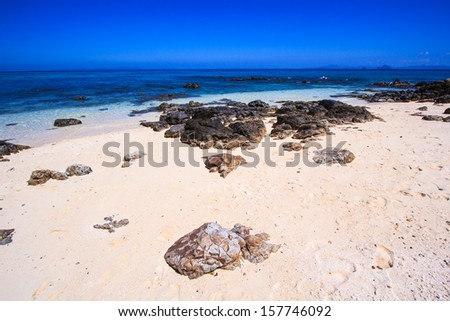Rocks on the beach in Tropical sea at Bamboo Island Krabi Province Southeast Asia Thailand