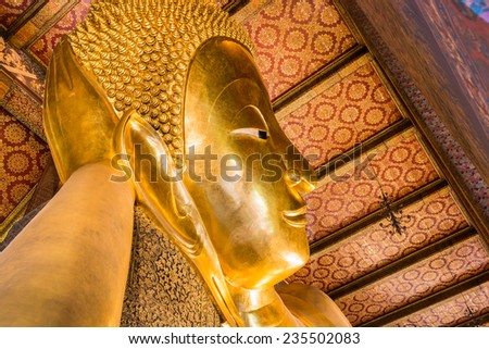 Reclining Buddha gold statue ,Wat Pho, Bangkok, Thailand,They are public domain or treasure of Buddhism, no restrict in copy or use
