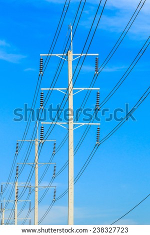 row of wire pole electricity post
