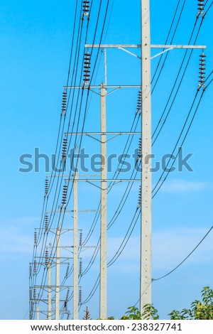 row of wire pole electricity post