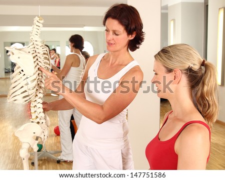 Physiotherapist Explaining The Spine