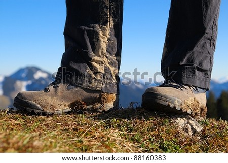Two dirty hiking boots after a hiking tour