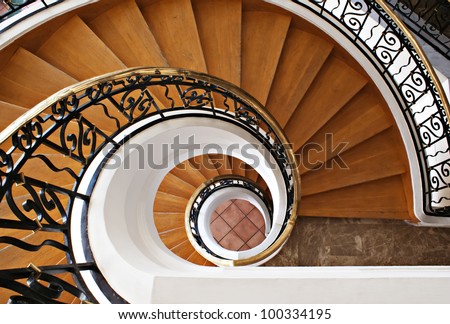 Detail of the wood spiral staircase in the hotel