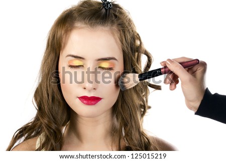 Eyes Makeup.Make-up.Eyes shadows. Brush for blush, Powder brush. Makeup artist apply makeup