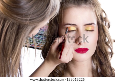 Eyes Makeup.Make-up.Eyes shadows. Eye shadow brush with shadows. Makeup artist apply makeup