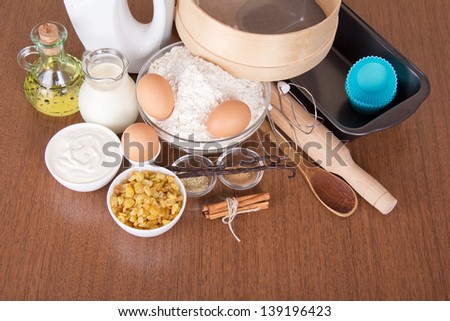 Products, set of spices, raisin and baking dish, on a table