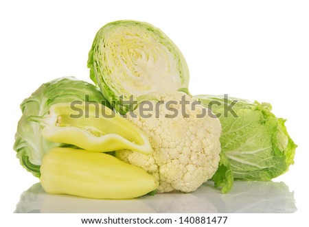 The Chinese cabbage, sweet pepper, white cabbage and cauliflower isolated on white
