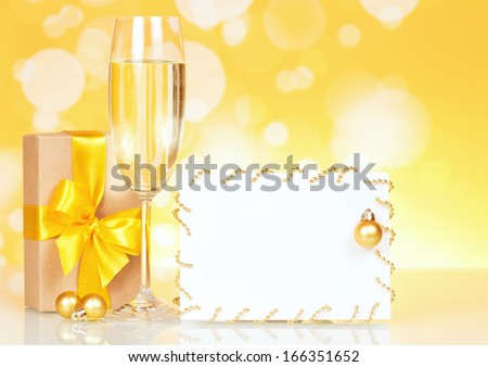 Flutes of champagne and empty card