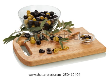 Green and black olives and knife on wooden board isolated on white background