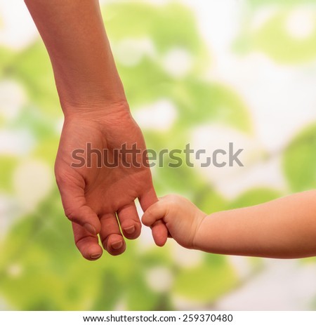 Male hand leading child, trust family concept