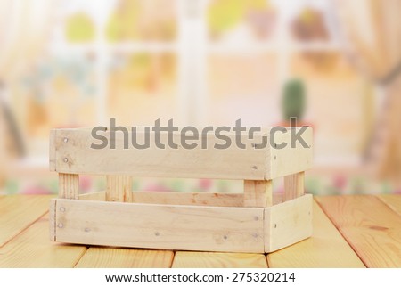 Empty wooden crate on table