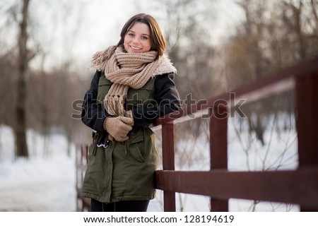 portrait of a young woman in winter park