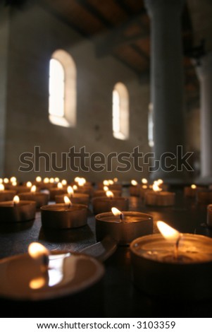 Tea light candles in a Catholic church