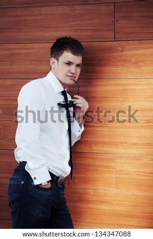 Young businessman thinking