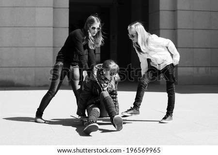 Group of school girls with skateboard