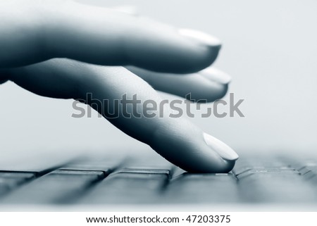 stock photo : Female hand typing on computer keyboard.