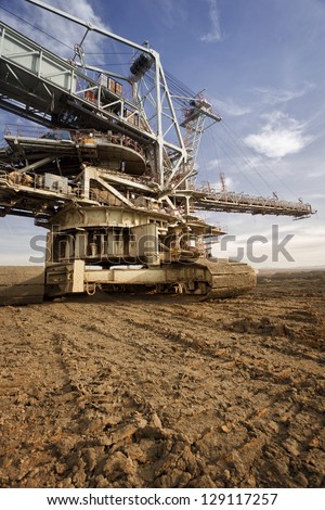 Huge mining machine - Photo of huge drill machine from a ground with wide angle lens.